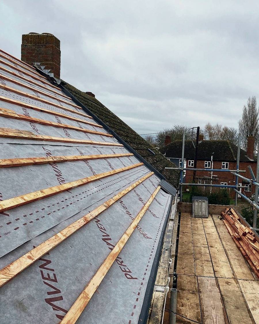 After: new breathable membrane and treated battens fitted