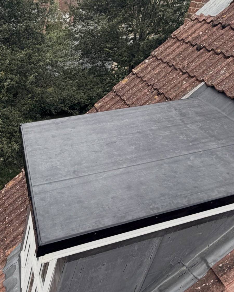 After: the dormer re-covered in one sheet of EPDM rubber with new trims