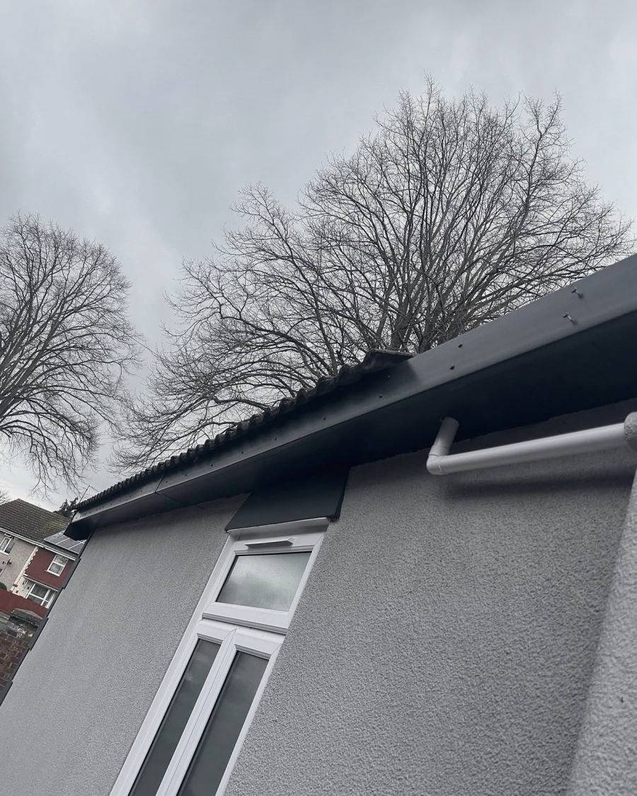 After: new anthracite fascia and soffit boards